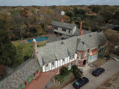Roofing crew installing new roof in Plano TX