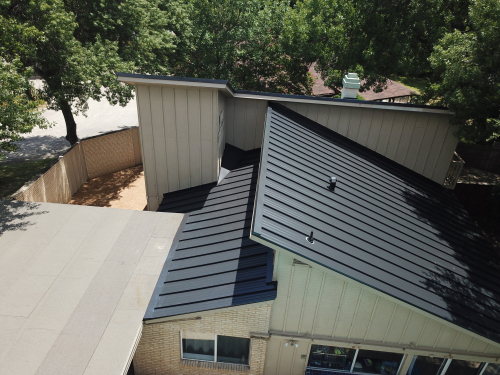 Beautiful standing seam metal roof on a residential home in DFW Texas
